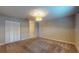 Spacious carpeted bedroom with closet space, neutral wall color, and overhead lighting at 124 White Fawn Dr # 1240, Daytona Beach, FL 32114