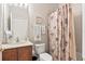 Cozy bathroom featuring a vanity, toilet, and shower-tub combo at 1320 Hansberry Ln, Ormond Beach, FL 32174