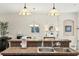 Kitchen sink and peninsula with stone counter and view of the dining area at 1320 Hansberry Ln, Ormond Beach, FL 32174