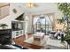 View of the living room with hardwood floors and sliding glass doors at 1320 Hansberry Ln, Ormond Beach, FL 32174