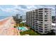 Beachfront condo featuring multiple balconies overlooking the Atlantic ocean and a community pool at 1133 Ocean Shore Blvd # 302, Ormond Beach, FL 32176