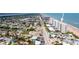 Aerial view shows the condo's prime location near the beach and convenient access to the main road at 1133 Ocean Shore Blvd # 303, Ormond Beach, FL 32176