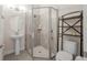 This bathroom features a stand up shower with tile walls, a sink, and a toilet at 525 Mosaic Blvd, Daytona Beach, FL 32124