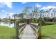 Scenic view of the pond, gazebo and surrounding trees at 57 Bella Lago Cir, Port Orange, FL 32129