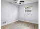 Clean and empty bedroom featuring modern flooring, a window, and neutral walls at 1011 Indian Oaks W, Daytona Beach, FL 32117