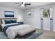 Serene bedroom with soft lighting, stylish decor, and a comfortable queen-sized bed at 1011 Indian Oaks W, Daytona Beach, FL 32117