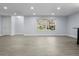 Expansive living area with a large window offering picturesque views and plenty of natural light at 1011 Indian Oaks W, Daytona Beach, FL 32117