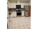 Modern kitchen with stainless steel appliances and granite countertops at 10891 Sw 86Th Ave, Ocala, FL 34481