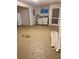Utility room includes washer, dryer, and exterior access at 10891 Sw 86Th Ave, Ocala, FL 34481