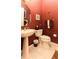 Powder room featuring pedestal sink and unique fixtures at 1317 Dovercourt Ln, Ormond Beach, FL 32174