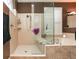 Tiled bathroom features glass shower, soaking tub, and stylish fixtures for a serene and luxurious experience at 1317 Dovercourt Ln, Ormond Beach, FL 32174