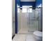 Bathroom featuring a glass-door shower and updated fixtures at 1317 Dovercourt Ln, Ormond Beach, FL 32174