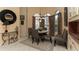 Charming dining area with cozy seating, decorative lighting, and large windows at 1317 Dovercourt Ln, Ormond Beach, FL 32174
