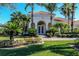 Beautiful single-story home featuring a meticulously maintained lawn, elegant landscaping, and a terracotta-tiled roof at 1317 Dovercourt Ln, Ormond Beach, FL 32174