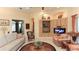 Inviting living room with built-in shelving and cabinetry, and cozy seating arrangement at 1317 Dovercourt Ln, Ormond Beach, FL 32174
