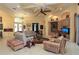 Spacious living room features neutral walls, comfortable furniture, and decorative touches at 1317 Dovercourt Ln, Ormond Beach, FL 32174