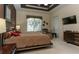 Comfortable main bedroom featuring ample natural light, a cozy seating area, and tasteful decor at 1317 Dovercourt Ln, Ormond Beach, FL 32174