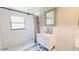 Bathroom featuring a single vanity, walk-in shower, and stylish finishes at 14 Sea Swallow Ter, Ormond Beach, FL 32176