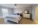 Cozy bedroom with a queen-size bed, neutral decor, and ample natural light at 14 Sea Swallow Ter, Ormond Beach, FL 32176