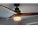 Unique ceiling fan with cage-style light fixture at 14 Sea Swallow Ter, Ormond Beach, FL 32176