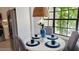 Dining nook featuring a round table, stylish decor, and a view of the outdoors at 14 Sea Swallow Ter, Ormond Beach, FL 32176