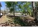 Backyard with trees and a body of water in the distance at 1601 Big Tree Rd # 601, South Daytona, FL 32119