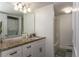 Bathroom area featuring a bathtub with a shower curtain and a laundry area with a washer and dryer at 1601 Big Tree Rd # 601, South Daytona, FL 32119