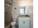 Bathroom vanity featuring light fixtures, and a shower with a shower curtain at 1601 Big Tree Rd # 601, South Daytona, FL 32119