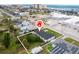 Aerial view of property boundaries with view of other homes, businesses, and the beach at 168 Boynton Blvd, Daytona Beach, FL 32118