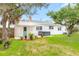 View of backyard with hot tub, porch and patio at 168 Boynton Blvd, Daytona Beach, FL 32118