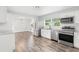 Well-lit open kitchen layout with stainless steel appliances, granite countertops, and modern finishes at 168 Boynton Blvd, Daytona Beach, FL 32118