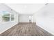 Bright and airy living room with wood floors and a view of the front door at 168 Boynton Blvd, Daytona Beach, FL 32118