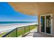 Balcony view showcasing ocean views and a glass door entrance at 4545 S Atlantic Ave # 3206, Port Orange, FL 32127