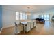 Bright and airy living room with ocean views and stylish dining area at 4545 S Atlantic Ave # 3206, Port Orange, FL 32127