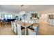 Bright and airy living room with ocean views and stylish dining area at 4545 S Atlantic Ave # 3206, Port Orange, FL 32127