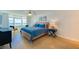 Inviting bedroom with ocean views, king bed, ceiling fan, and plenty of light at 4545 S Atlantic Ave # 3206, Port Orange, FL 32127