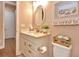 Well-lit bathroom with neutral tones, quartz counters and coordinated decor at 604 Mosaic Blvd, Daytona Beach, FL 32124
