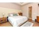 Cozy bedroom with ensuite bathroom access and stylish decor, complete with a comfortable bed at 604 Mosaic Blvd, Daytona Beach, FL 32124