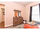 bedroom with warm wood tones, a themed bed and colorful decor at 604 Mosaic Blvd, Daytona Beach, FL 32124