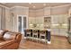 Elegant kitchen with an island, marble countertops, stainless appliances, and an open layout connecting to living spaces at 604 Mosaic Blvd, Daytona Beach, FL 32124