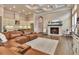 Open living area with fireplace and adjacent kitchen, ideal for entertaining and relaxation at 604 Mosaic Blvd, Daytona Beach, FL 32124