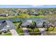 Scenic aerial view of homes nestled within a lush, tree-filled community near a lake at 6123 Jasmine Vine Dr, Port Orange, FL 32128