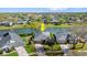 An aerial shot highlighting the home's location on the water and a well-maintained lawn at 6123 Jasmine Vine Dr, Port Orange, FL 32128