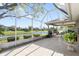 Lovely screened patio offering serene water views and a relaxing outdoor seating area at 6123 Jasmine Vine Dr, Port Orange, FL 32128