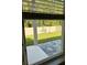 Backyard view from a window featuring a patio and fenced-in yard at 137 Eagle Harbor Way, Daytona Beach, FL 32124