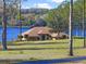 A house with lake access at 22527 Lake Seneca Rd, Eustis, FL 32736