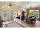 Elegant foyer leads to a dining area and seating area, enhancing the open-concept design at 3428 Rexford Cir, Ormond Beach, FL 32174