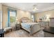 A primary bedroom suite is illuminated with natural light and features neutral walls and light flooring at 3428 Rexford Cir, Ormond Beach, FL 32174