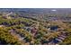 Aerial view showcasing the home's location within a lush, green, wooded neighborhood at 3220 Galty Cir, Ormond Beach, FL 32174