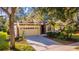 Well-kept home featuring a two-car garage, nicely landscaped yard, and covered front entry at 3220 Galty Cir, Ormond Beach, FL 32174